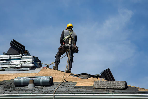 Professional Roof Replacement technician working in Wampsville, NY